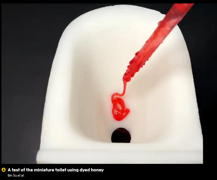 A red liquid dripping from a toilet bowl

Description automatically generated