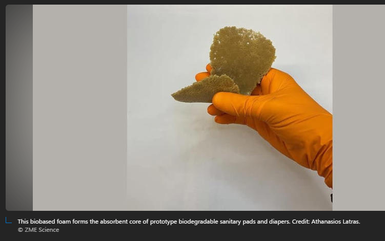 A hand in a glove holding a sponge

Description automatically generated